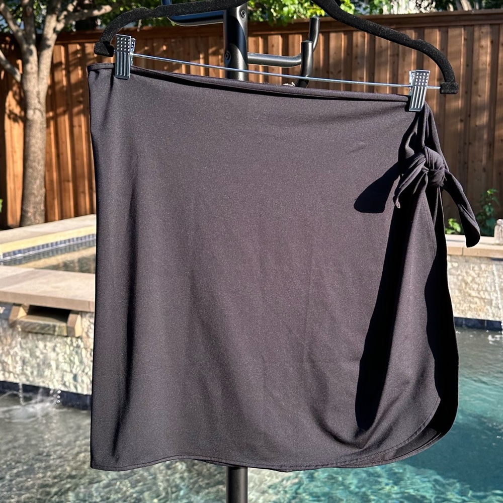 Black short side tie sarong.  Size L/XL. Swimsuit material. Worn once.